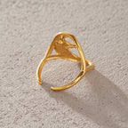 Side and back of the open moon-face ring