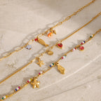 Gold Plated Stainless Steel Ocean Charm Bracelet Collection — front view