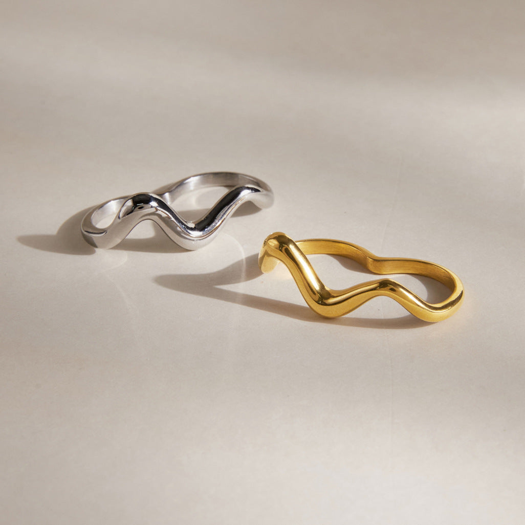 Gold tone and silver tone wavy double-finger rings