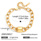 Oval-link bracelet with a sculpted central connector