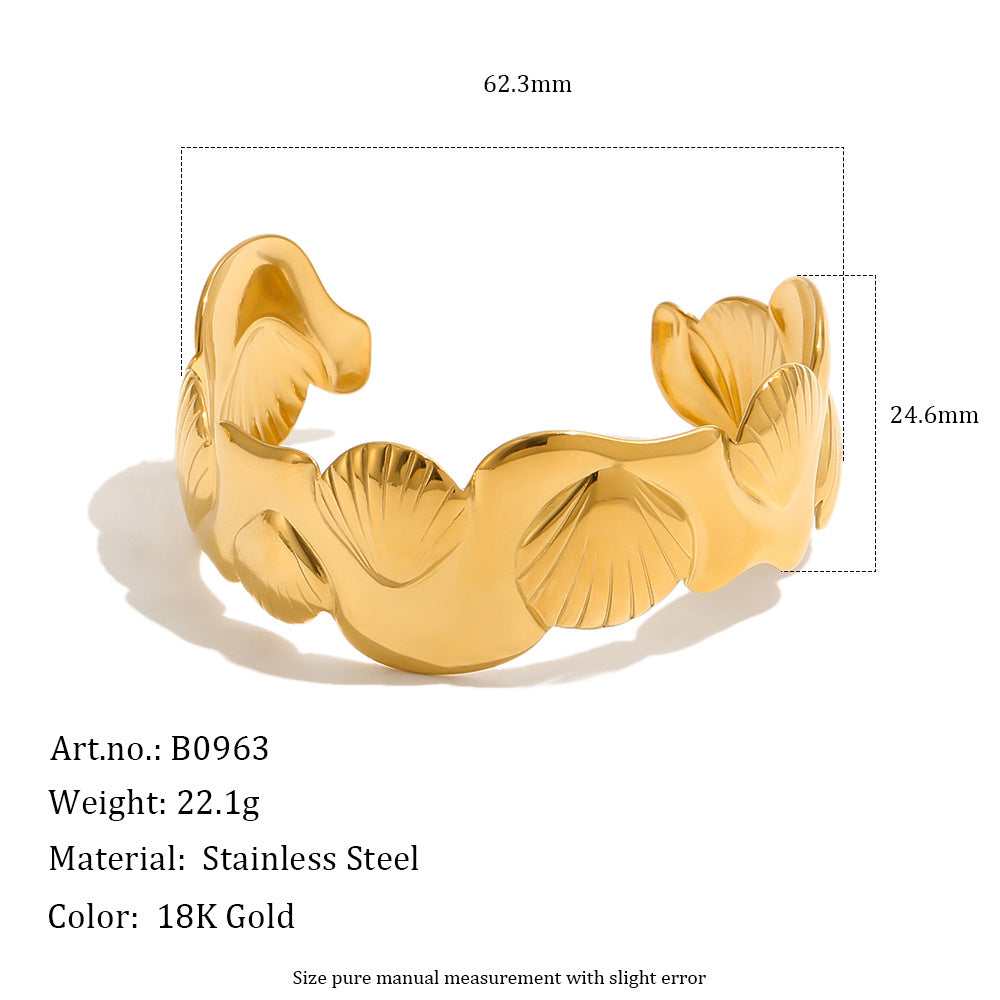Sculpted shell-border cuff with size and weight guide