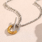 gold plated textured ring and silver-finish bar pendant from above