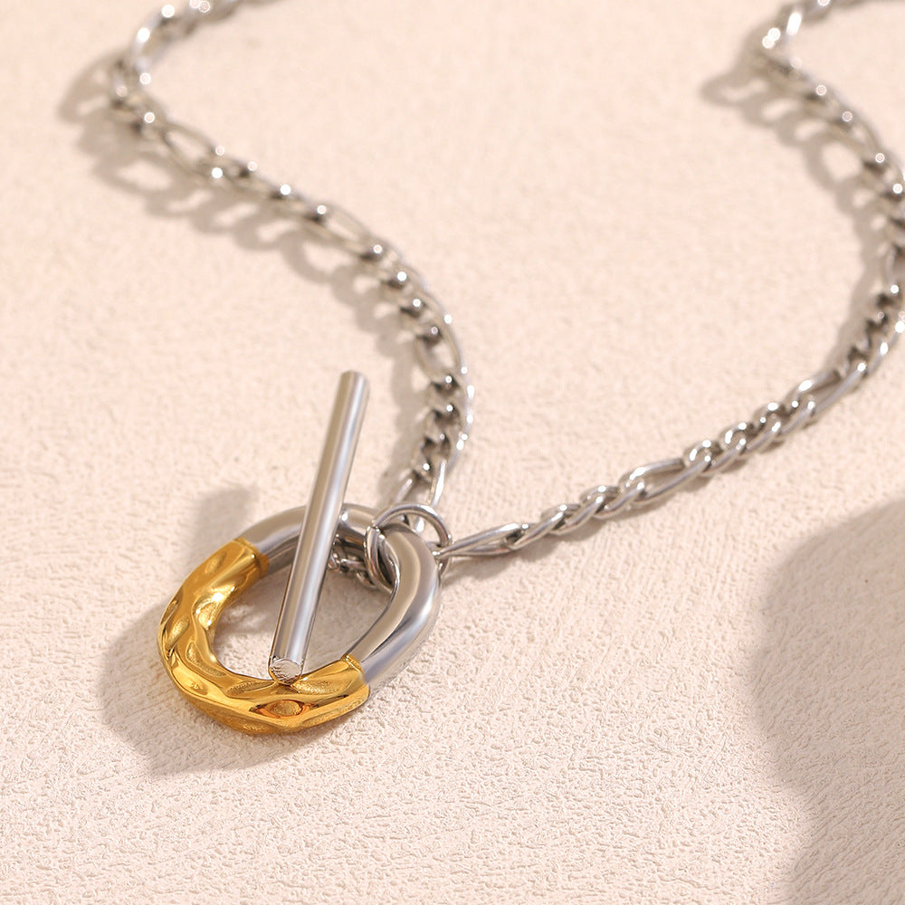 gold plated textured ring and silver-finish bar pendant from above