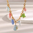 close view of colorful fish starfish shell and seahorse charms