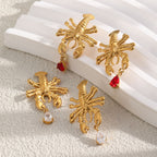 Red and clear drop lobster earring pairs displayed together