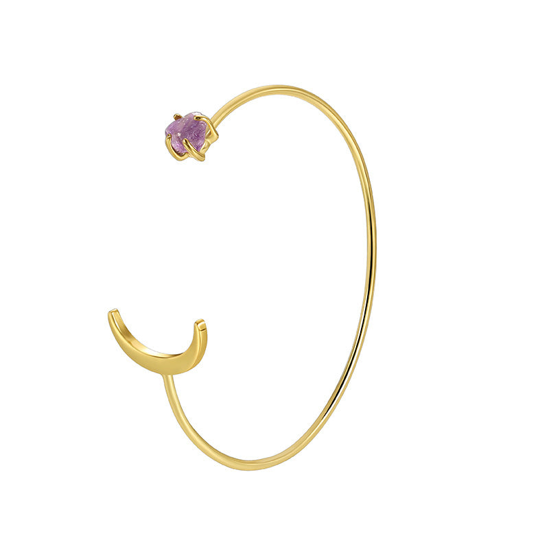 isolated asymmetrical crescent cuff bracelet on white