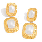 Gold Tone Pearl-Look Stainless Steel Double Drop Earrings — close-up of the pearl-look inlays