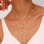 model wearing the minimalist freshwater pearl Y necklace