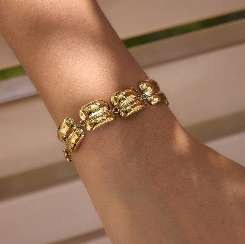 Rounded sculpted links shown on a wrist