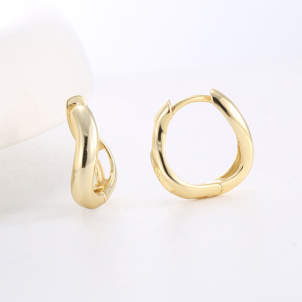 front and rear views of tapered open gold plated huggies