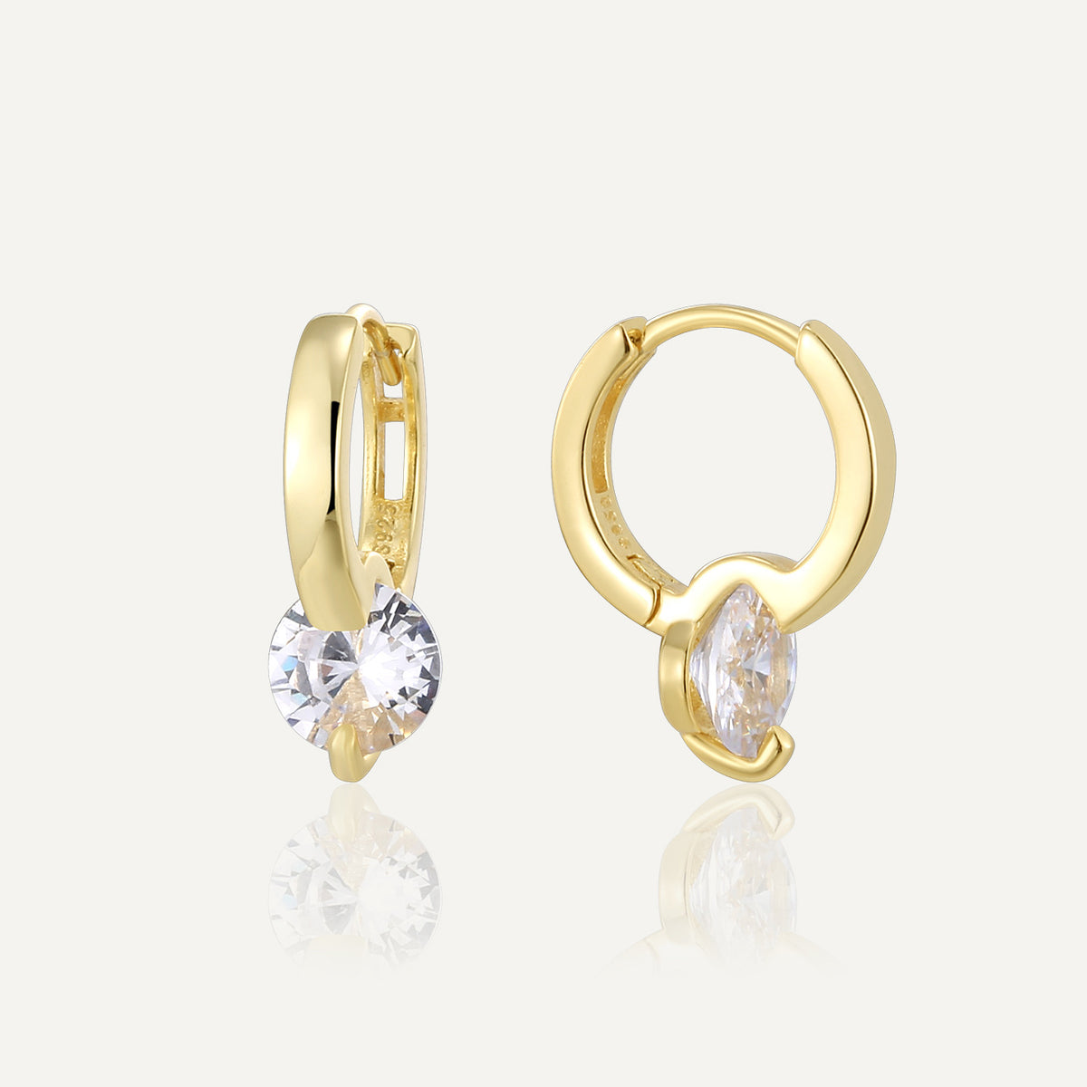 gold plated 925 silver huggies with single round clear zirconia