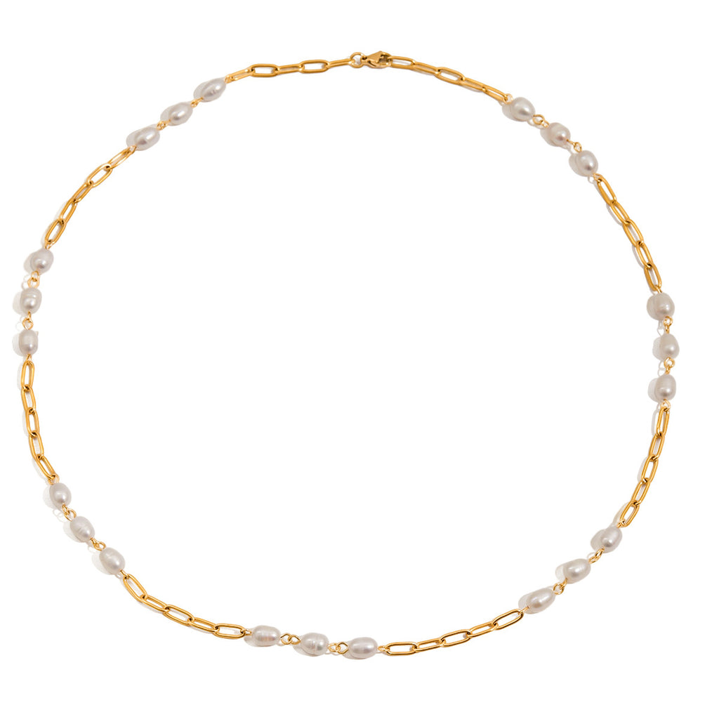 Full view of long gold plated pearl station necklace