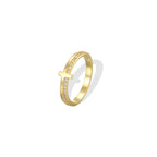 angled gold plated cross band showing clear accent stones