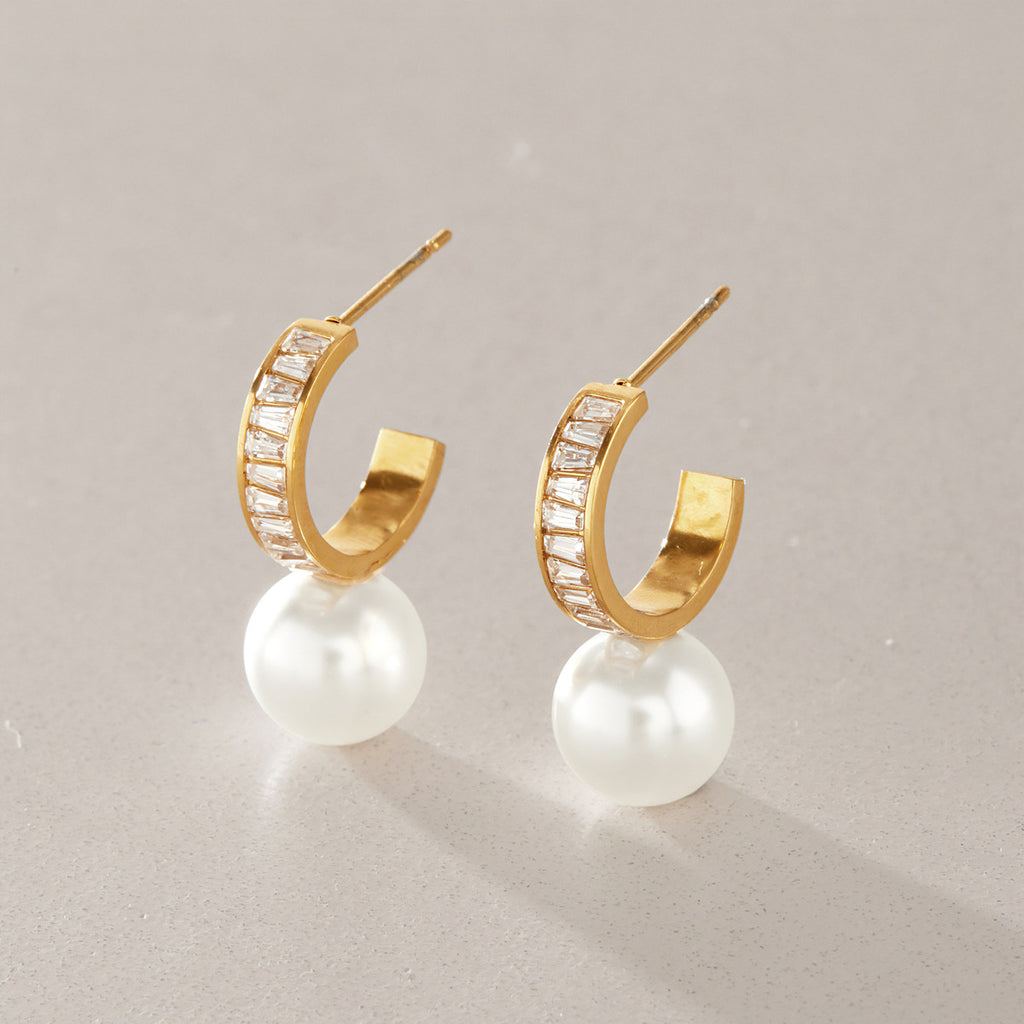 Pair of baguette zirconia hoops with white glass pearl drops