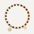 gold plated sunburst bracelet with faceted brown beads