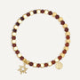 gold plated sunburst bracelet with faceted brown beads