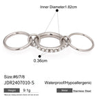 Silver-tone linked rings with white accents and measurements