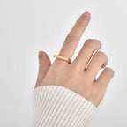 model wearing a minimalist rectangular bar signet ring