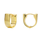 gold plated wide huggie earrings on a white background