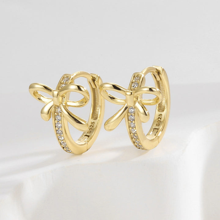 925 Sterling Silver Bow Zirconia Huggie Hoop Earrings — upright gold pair with pave detail