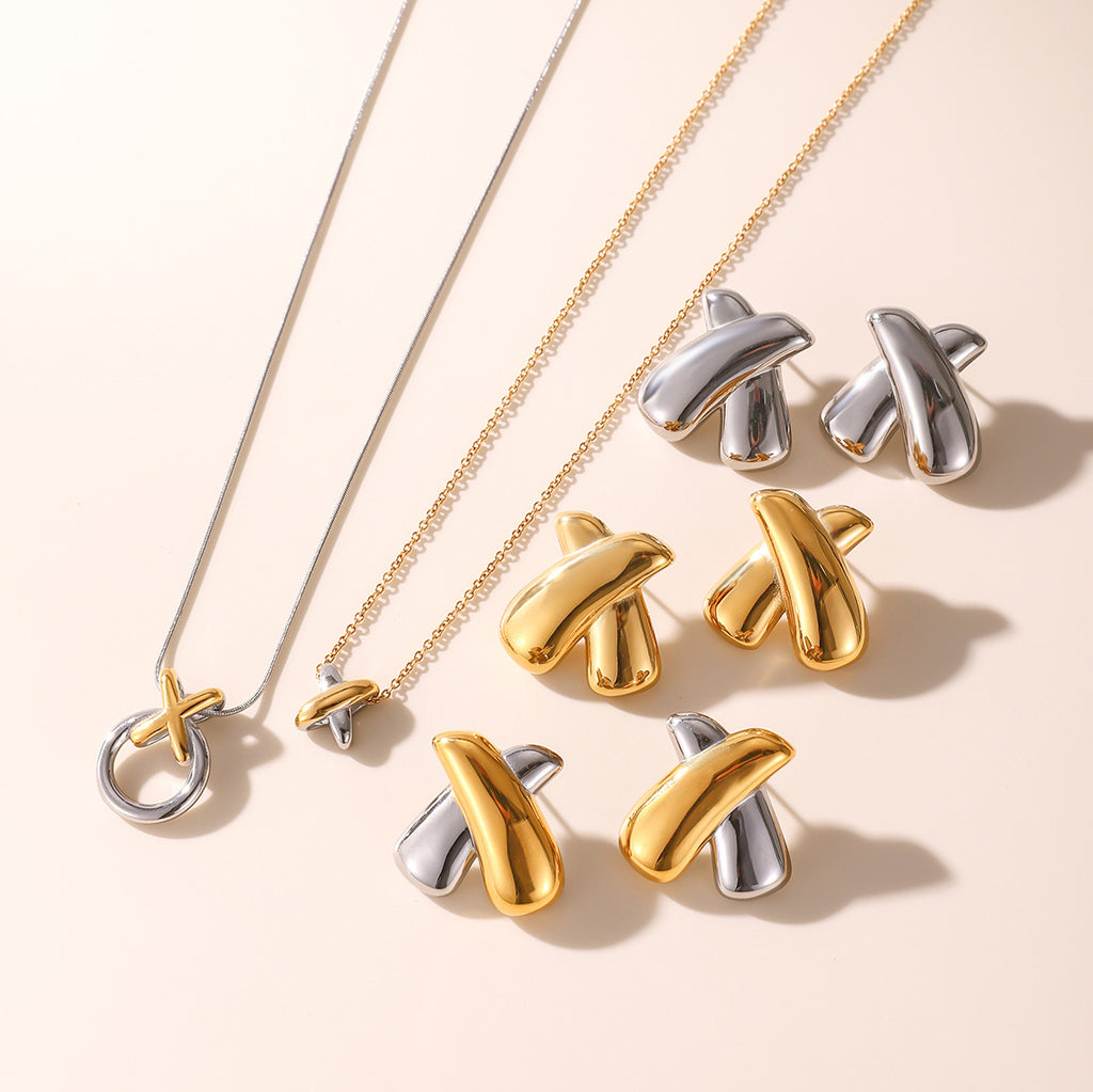 Wholesale Stainless Steel Bow Stud Earrings and Pendant Necklace Collection - side profile