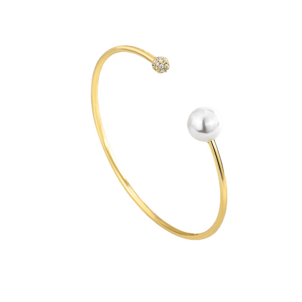 isolated front view of pearl-style stone cluster open bangle