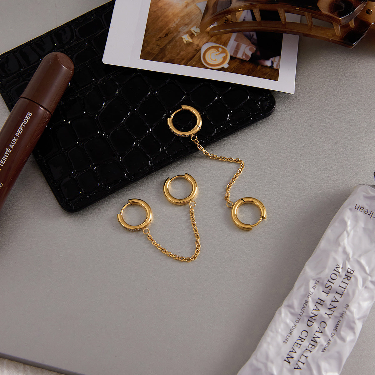 Gold Plated Clear Stone Double Huggie Chain Earrings — styled view