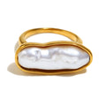 isolated gold plated elongated pearl cocktail ring