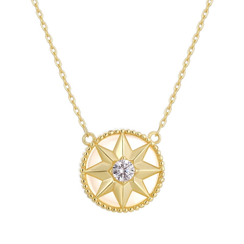 isolated eight-point star medallion with clear center stone