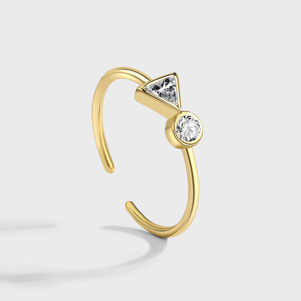 side profile of the bezel-style triangle and round stone settings