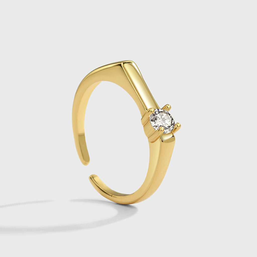 gold plated brass open ring with round clear stone