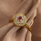 front view of textured gold plated medallion cocktail ring