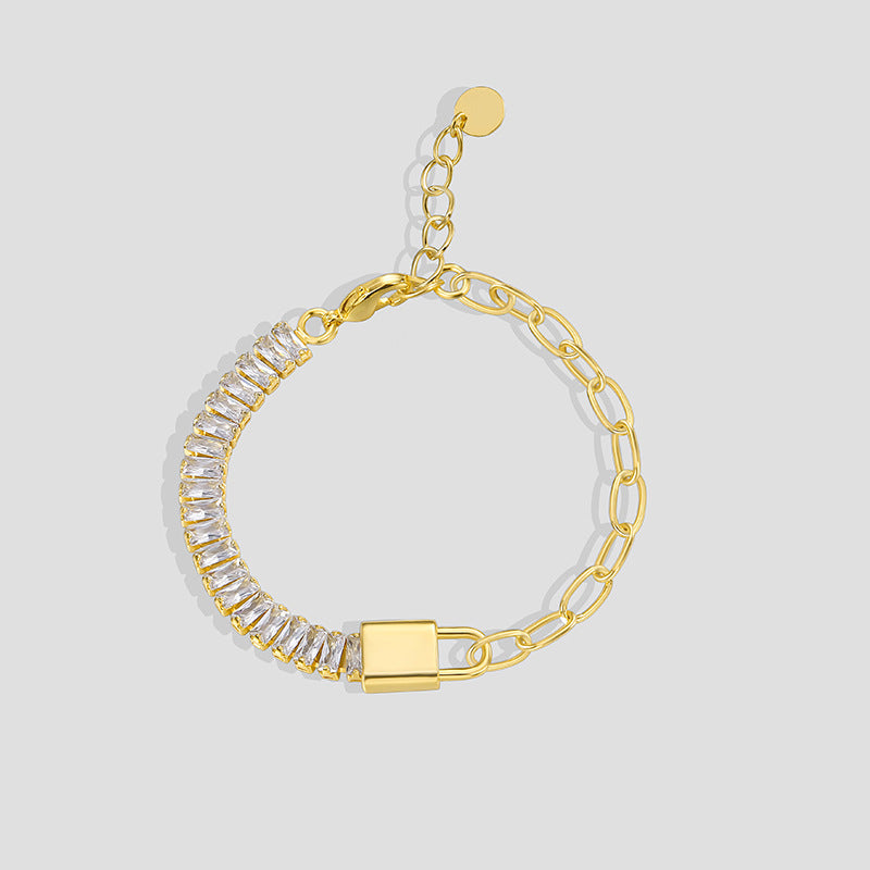 gold plated asymmetrical zirconia and elongated-link chain bracelet