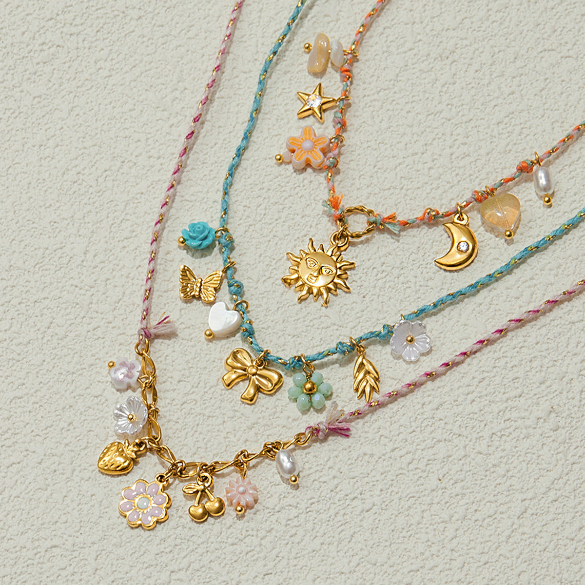 Colorful Charm Cord Stainless Steel Necklace Collection – flat-lay view
