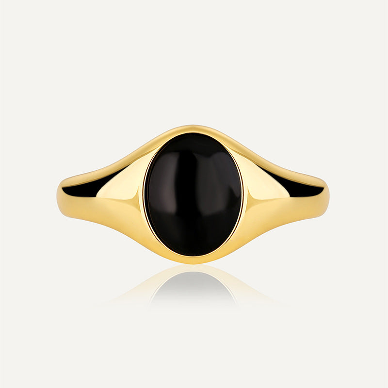 gold plated brass signet ring with oval black resin cabochon