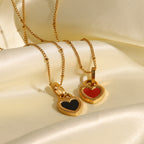 Black and red heart necklaces shown together for color comparison