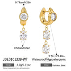 Gold tone clear zirconia earrings with asymmetric drop measurements
