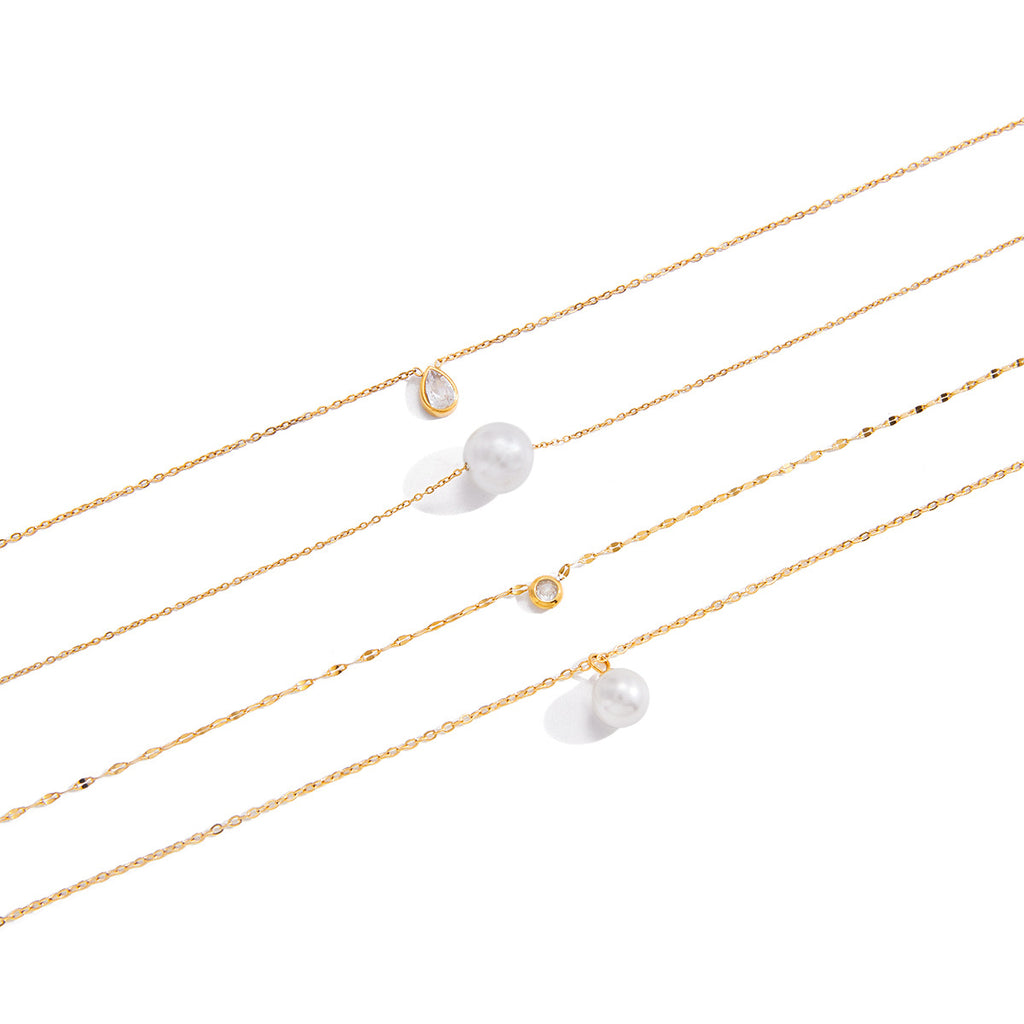 Gold-Tone Clear Accent Stainless Steel Pendant Necklace Collection finish and shape detail