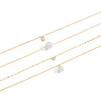 Gold-Tone Clear Accent Stainless Steel Pendant Necklace Collection finish and shape detail