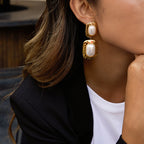 Gold Tone Pearl-Look Stainless Steel Double Drop Earrings — angled view of the irregular frames