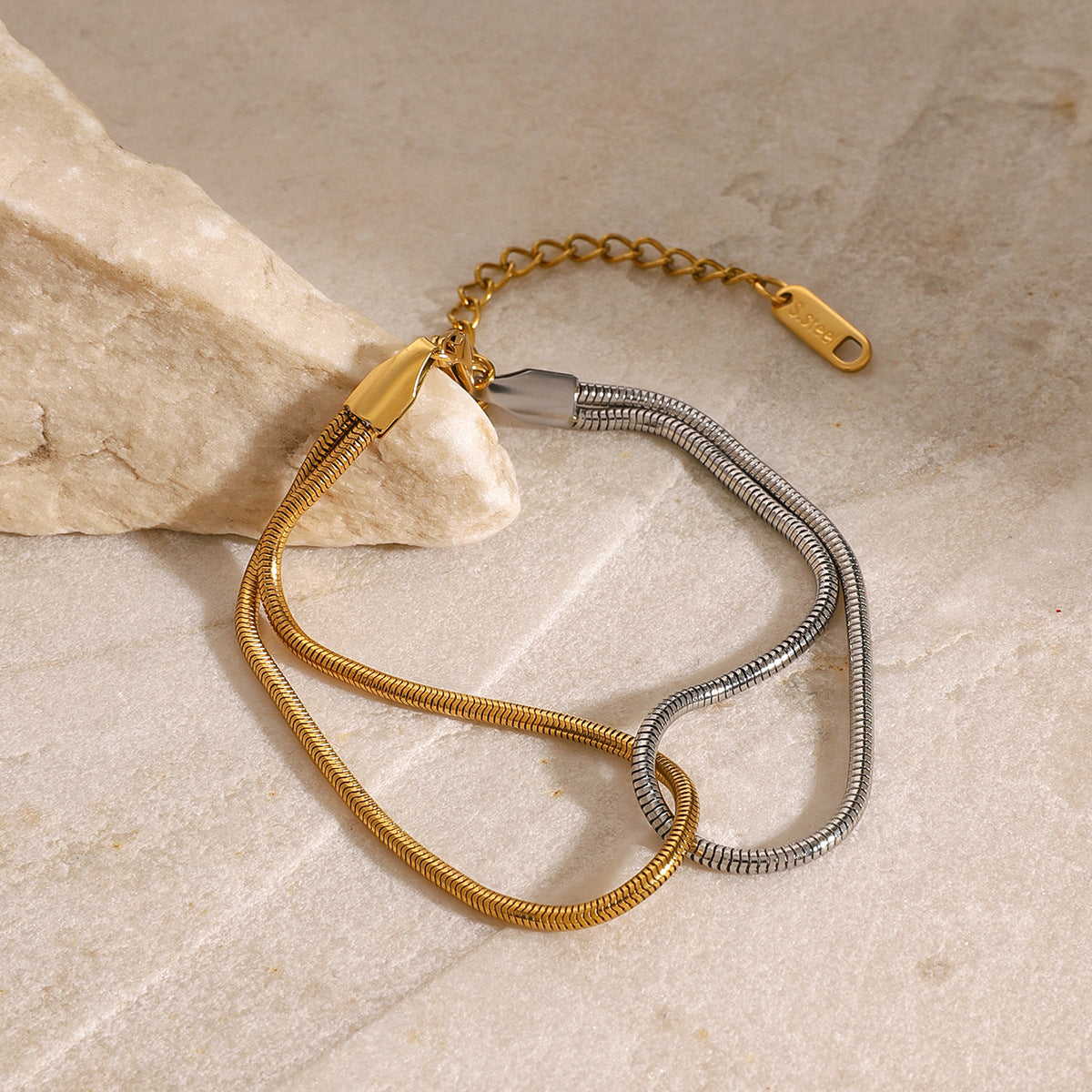 Two-Tone Wave Stainless Steel Link Bracelet — detail view