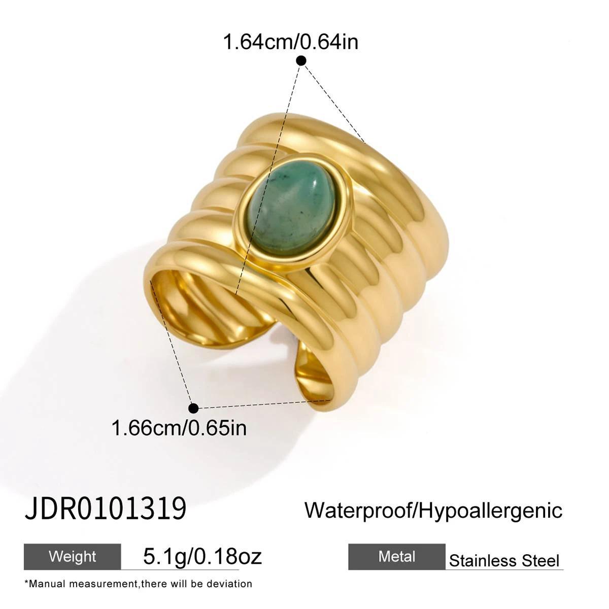Ribbed open ring with a green oval accent