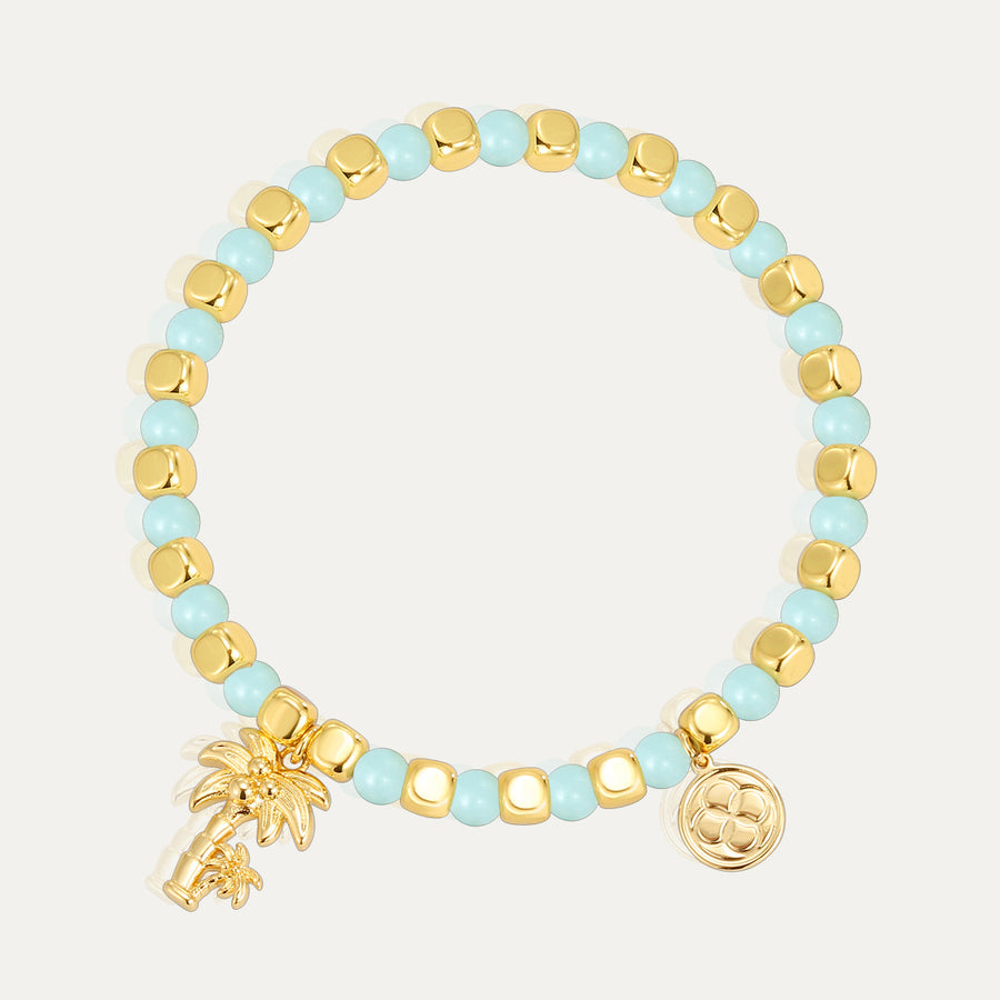 aqua and gold-color beaded bracelet with palm tree charm