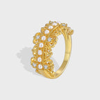 isolated gold plated shell pearl filigree cocktail ring