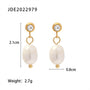 freshwater pearl drop earrings with 21 by 8 mm dimensions and 2.7 g weight