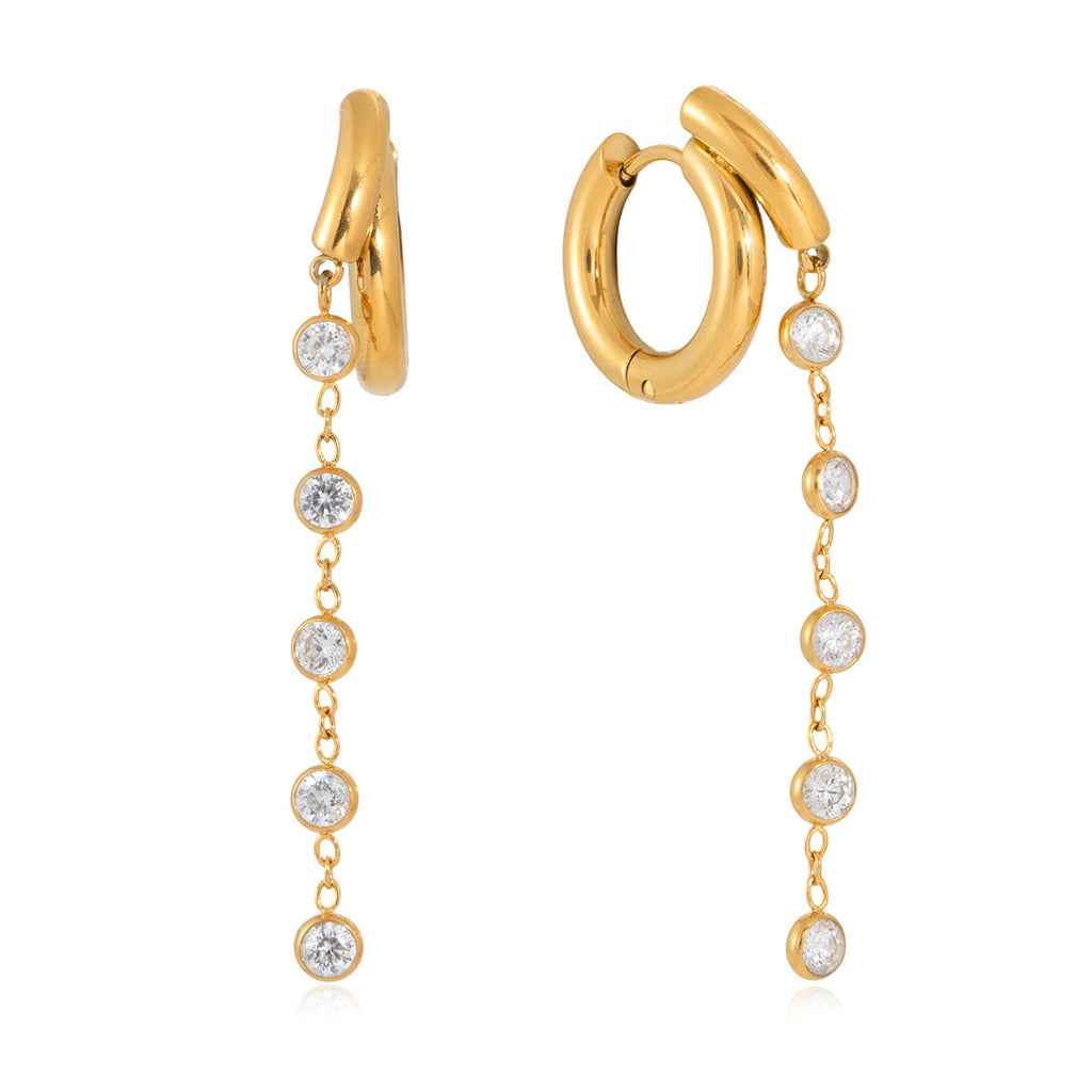front and side views of clear stone cascade huggie earrings