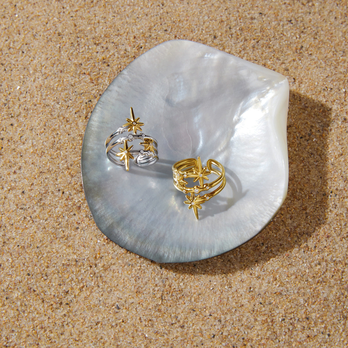 Two starburst rings displayed on a shell