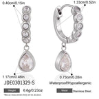 Silver tone huggie specification view with teardrop measurements