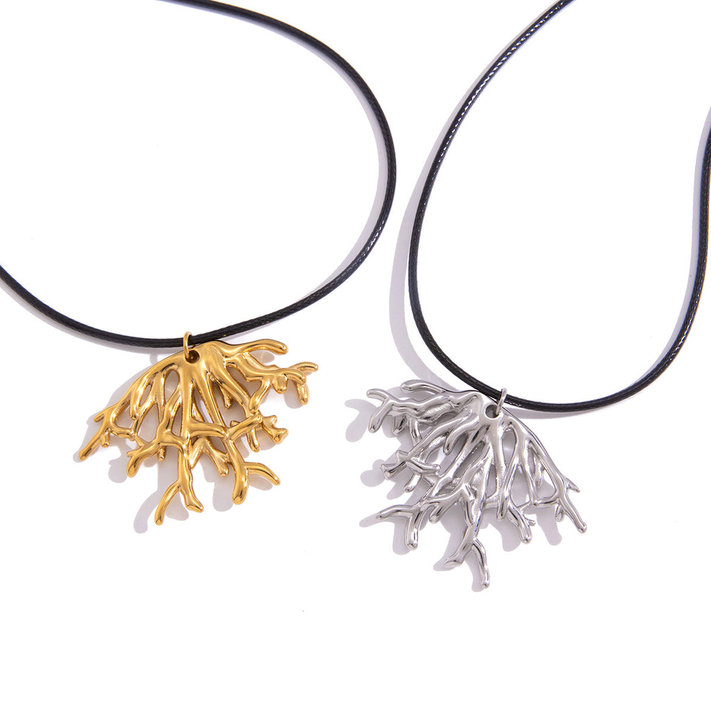 Coral-branch cord necklaces on white