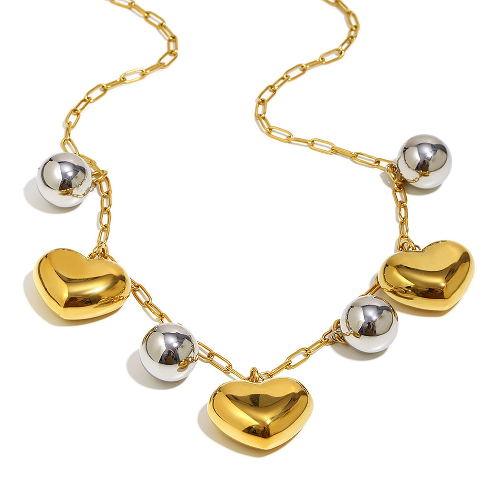 isolated open-link necklace with alternating hearts and round beads